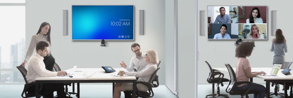 Q-SYS divisible space: two meeting areas, one with a video call on screen