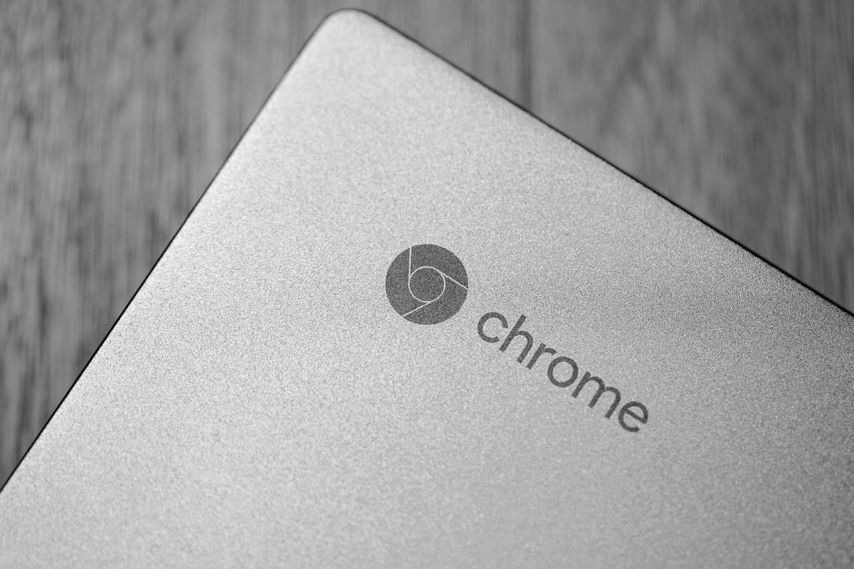Close-up of the Chrome logo on the lid of a Chromebook